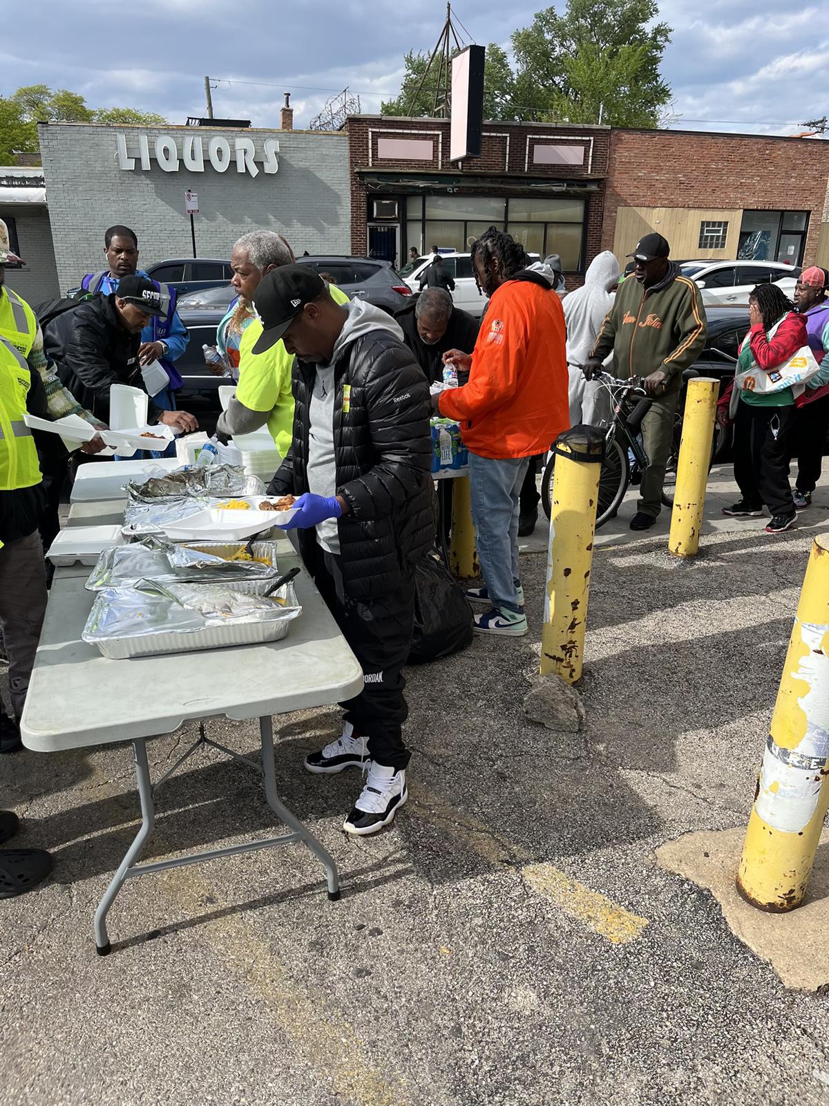 People make and serving plates of food